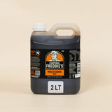 Bottle of Corporal Freddie's Worcestershire sauce on a beige background