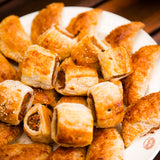 homemade sauce rolls on a white plate