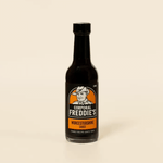 bottle of Corporal Freddie's Worcestershire Sauce turning around 